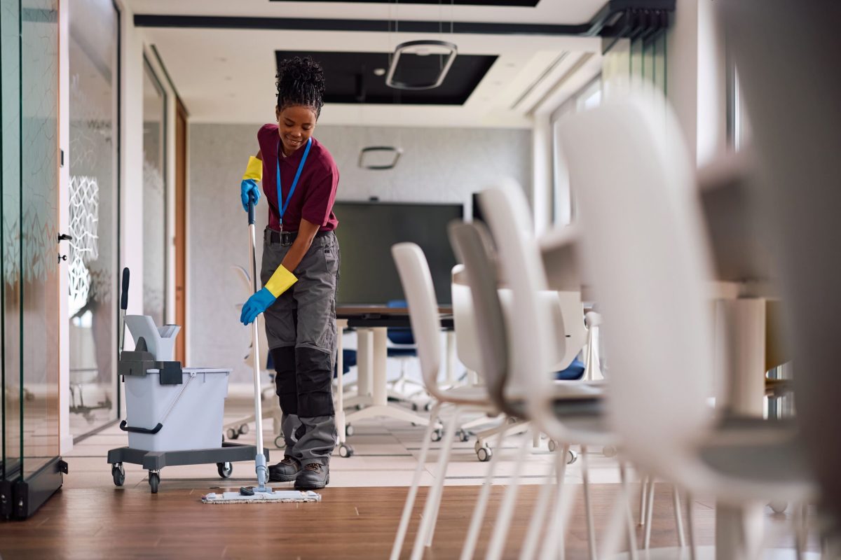 black-office-cleaning-service-employee-mopping-the-2026-06-15-20-23-50-utc (1)